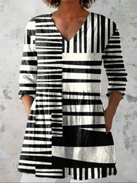 Capri | Blusa lunga a V